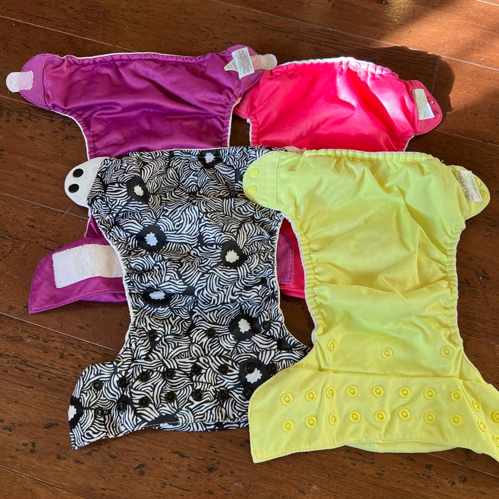 4 Bum Genius diapers shells and liners